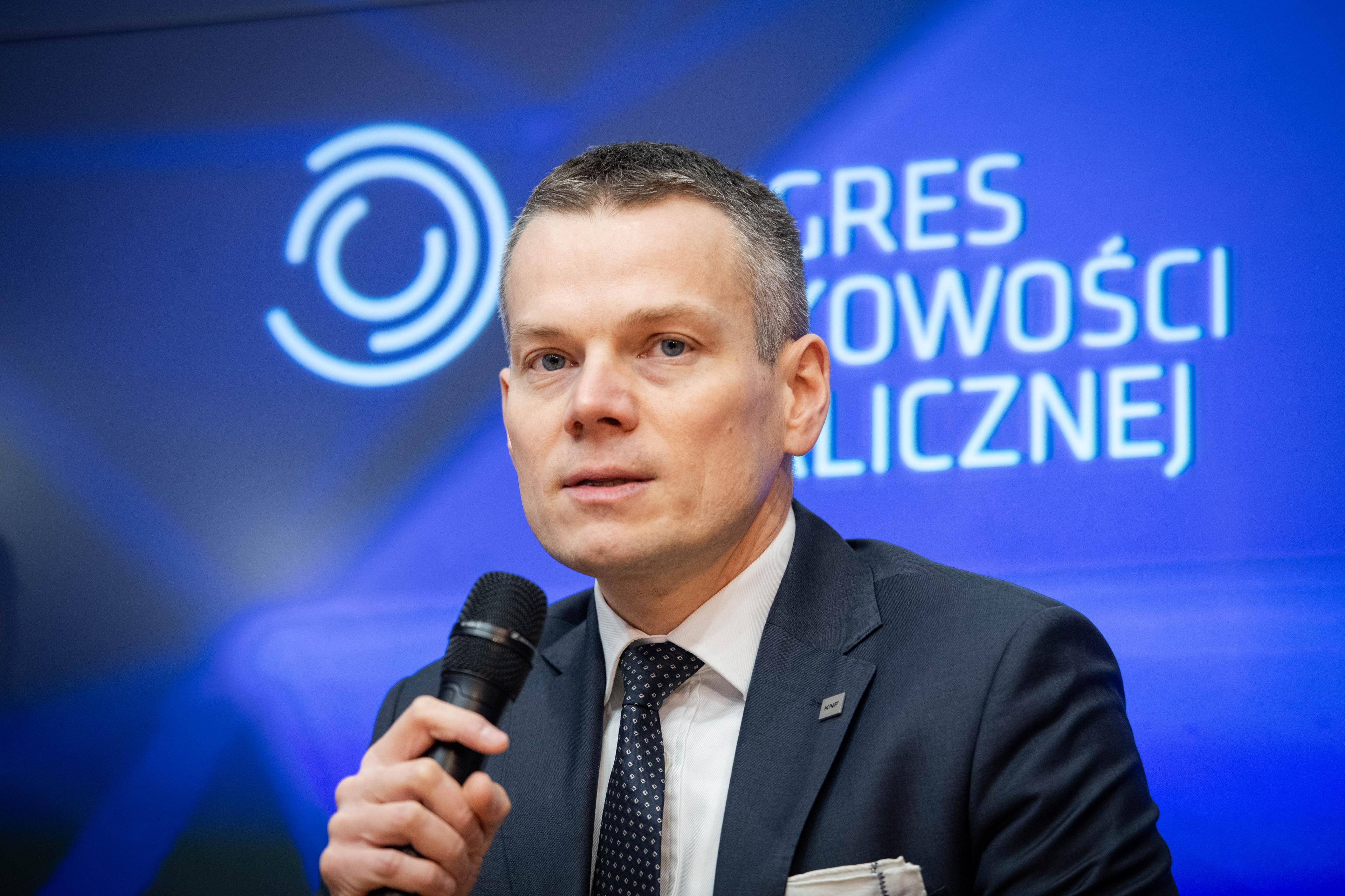 Jacek Jastrzębski with microphone in hand