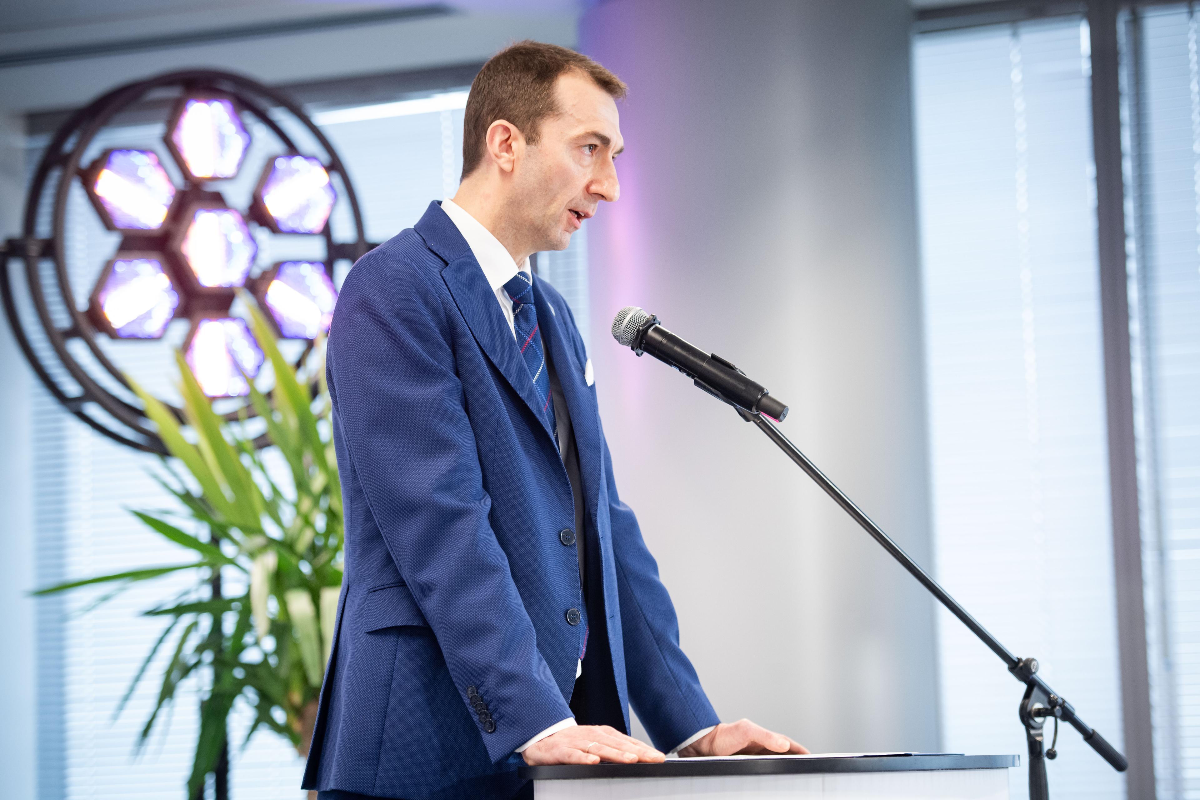 Krystian Wiercioch speaks to microphone